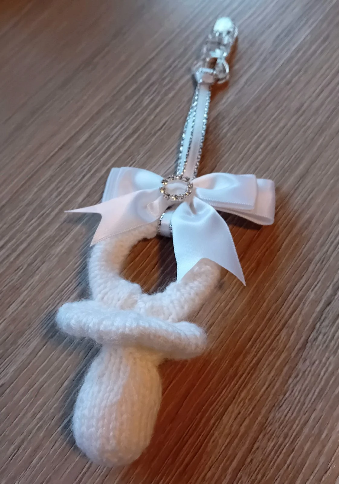 Unisex white knitted baby dummy charm