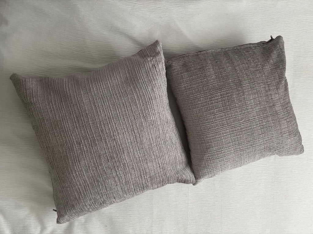 2x grey textured square cushions pillows