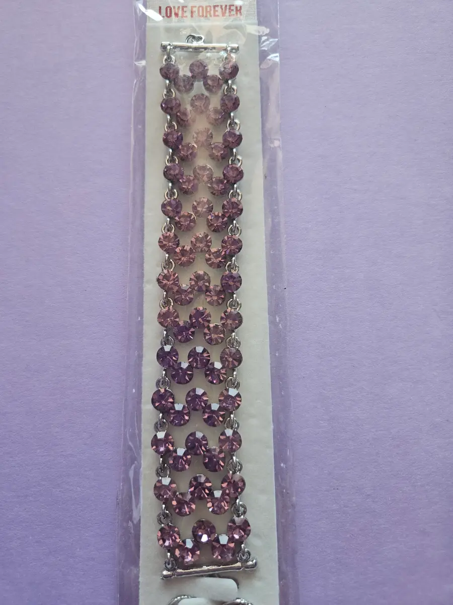 Bracelet, pink and silver in colour