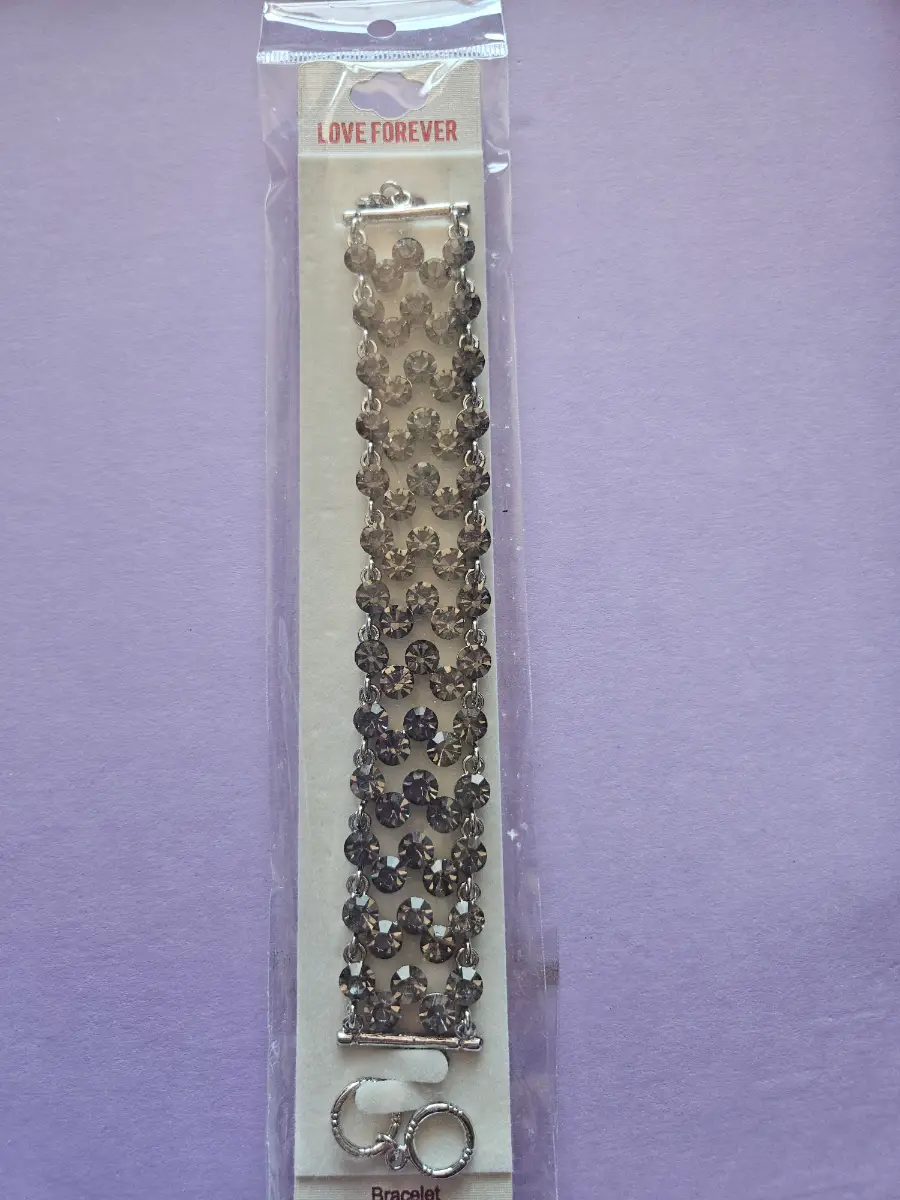 Womens bracelet black and silver in colour