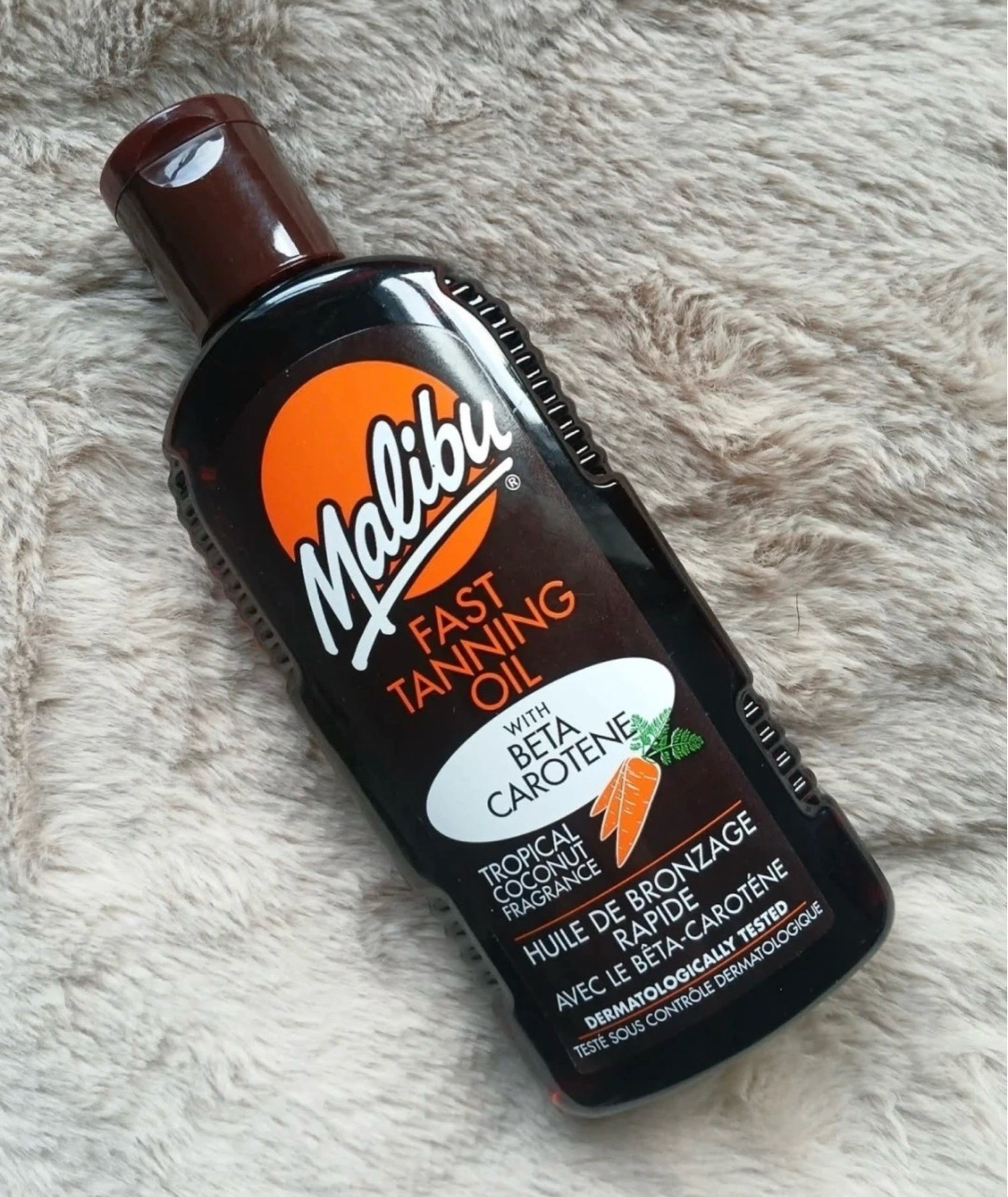 Malibu Fast Tanning Oil with Beta Carotene.