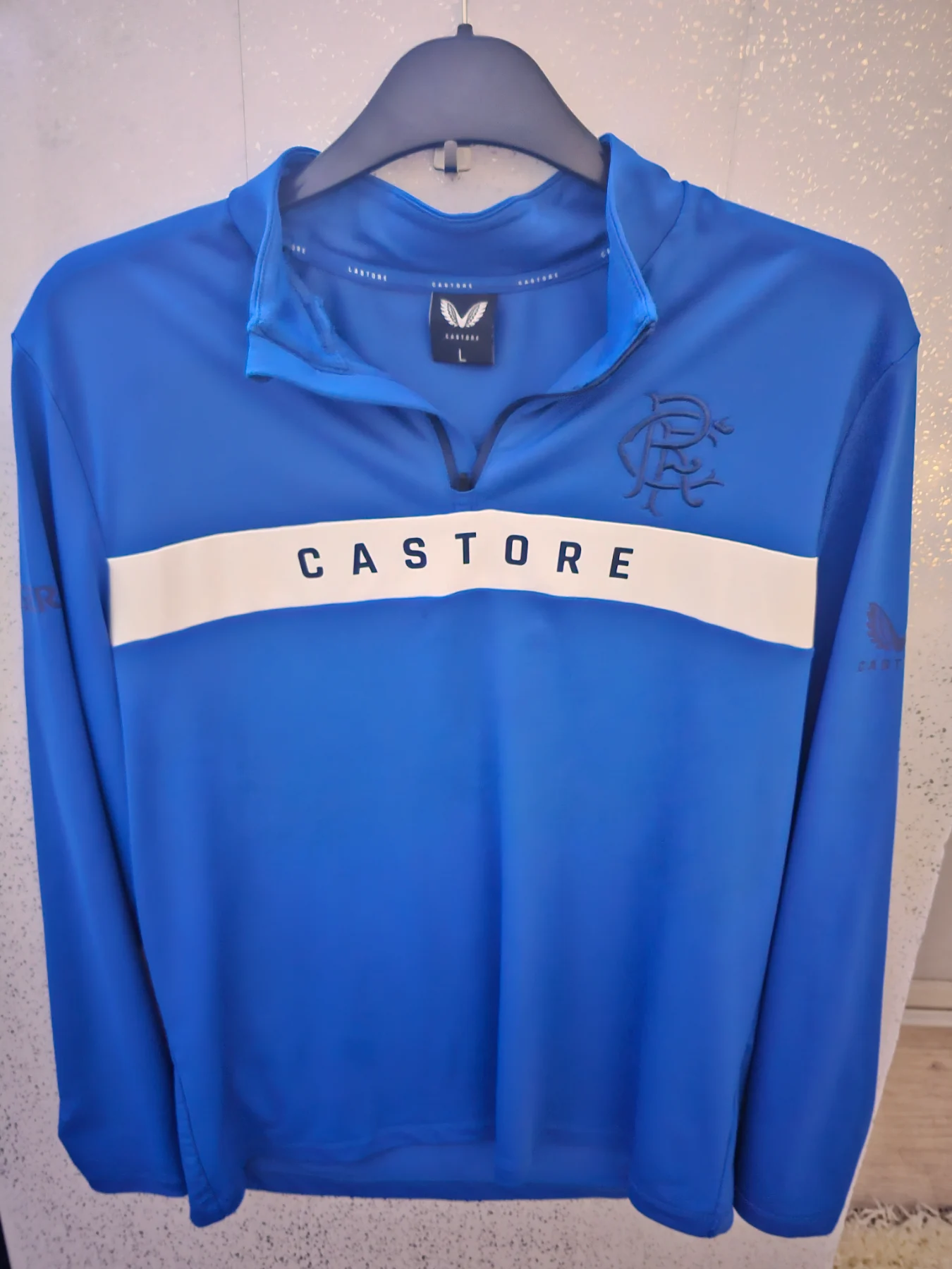 Official Rangers FC training top by Castore