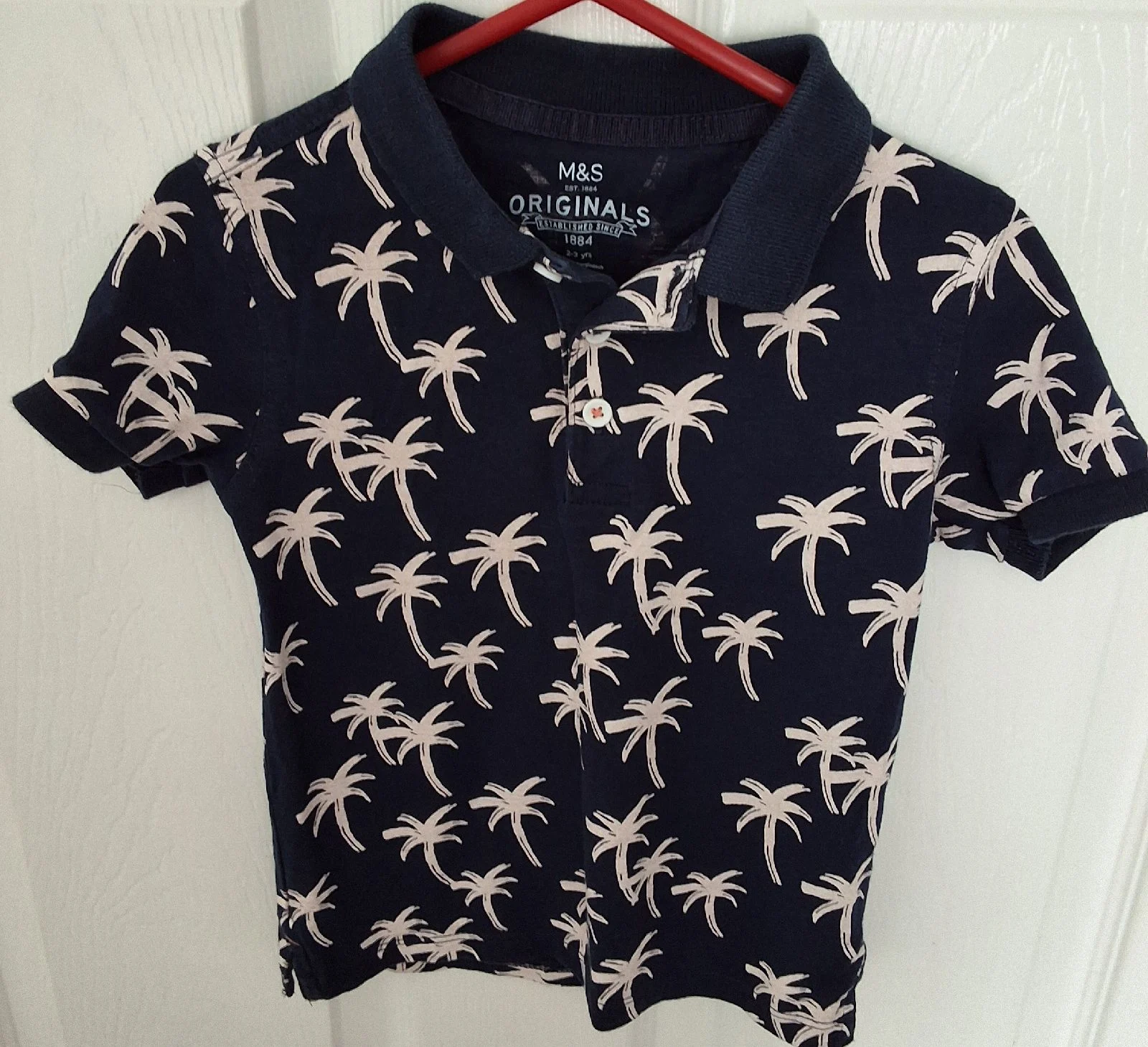 M&S boy's navy blue palm tree print pole shirt