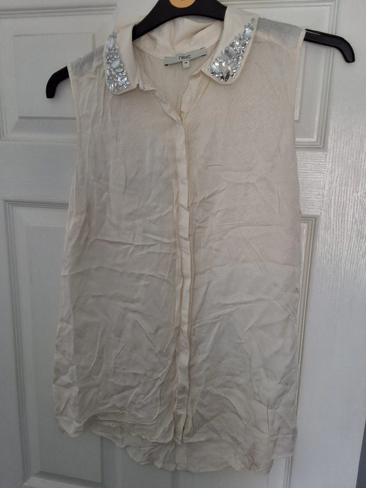 Ladies sleeveless blouse size 14