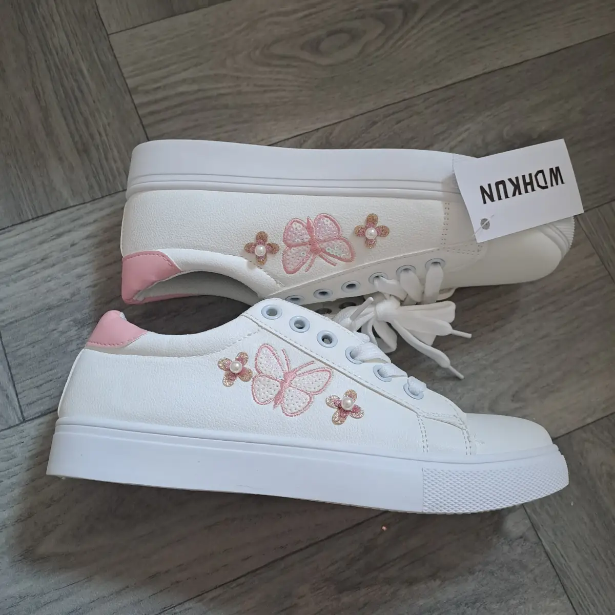 Ladies casual trainers with butterfly motif