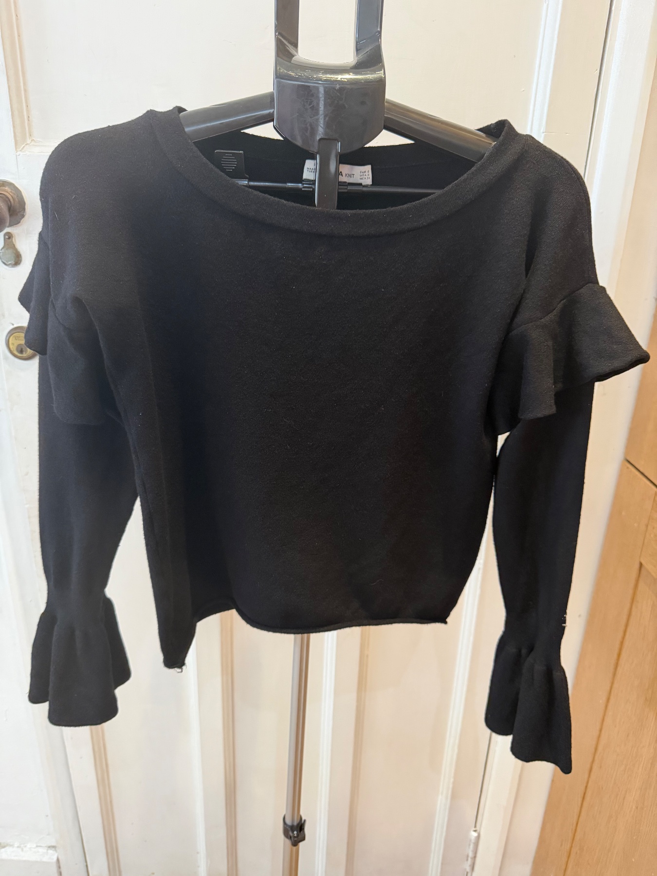 Zara black jumper with ruffles on sleeve in size euro small