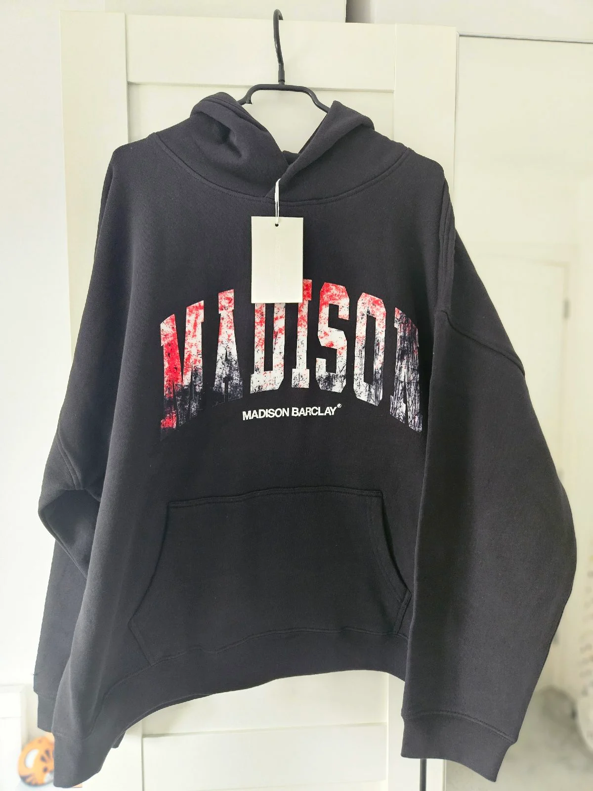 Madison men's hoodie in black size Large