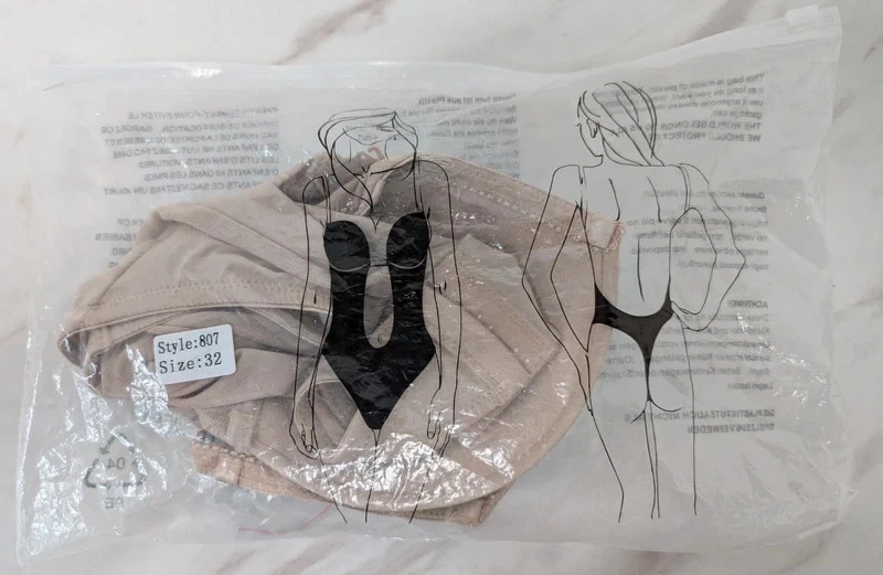 Body suit size 32 nylon, spandex