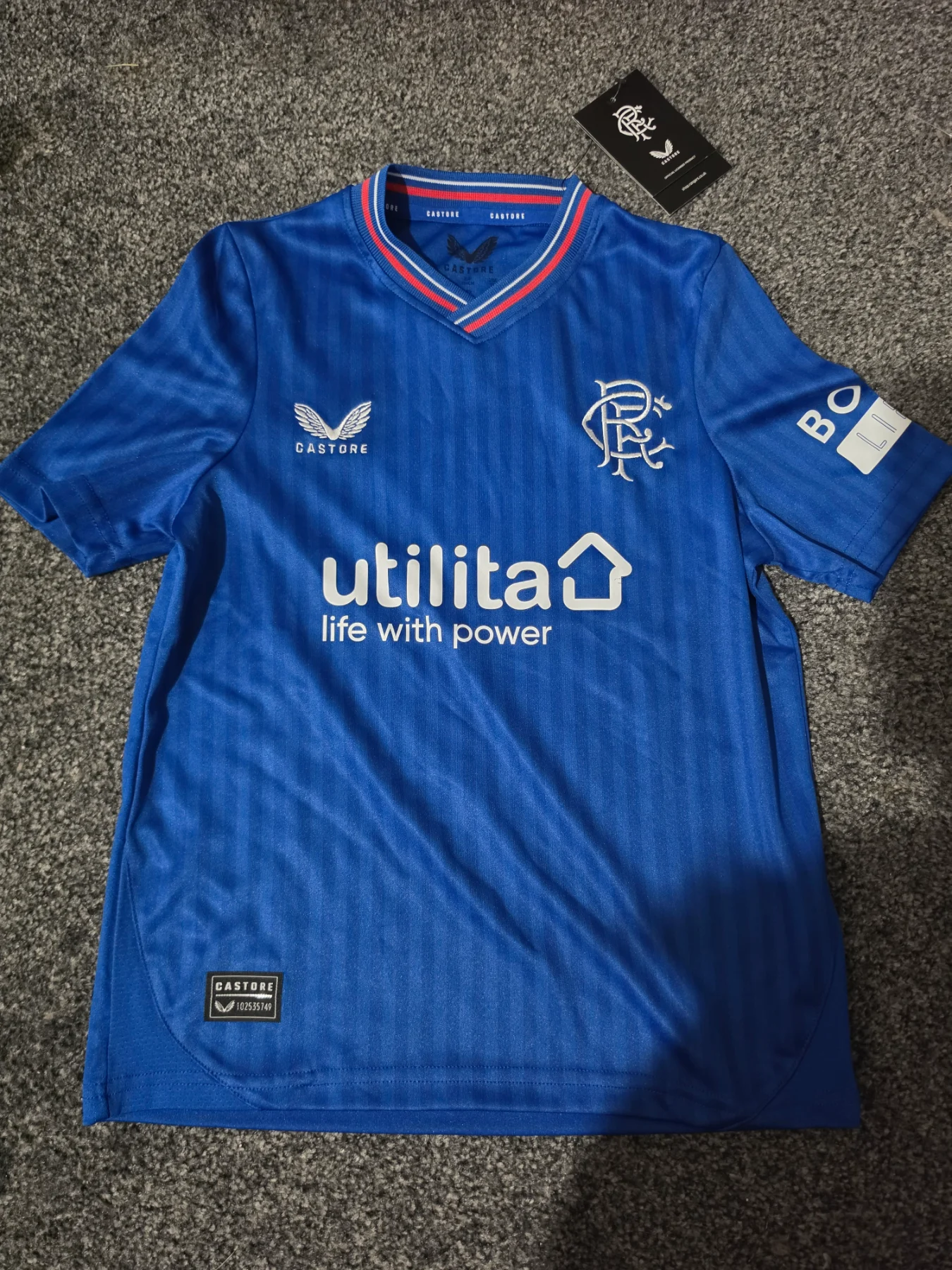 Boys age 8-9 Rangers short sleeved castore top, NWT