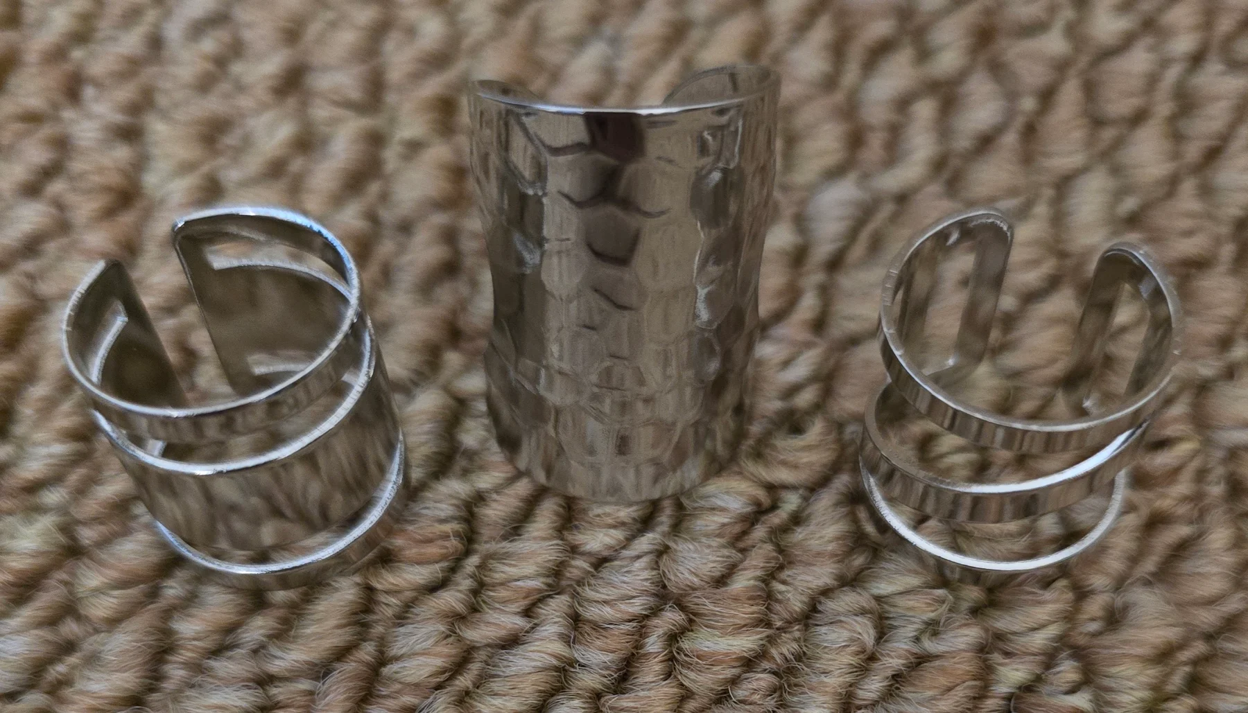 Set of 3 Adjustable Silver Tone Stainless Steel Rings.