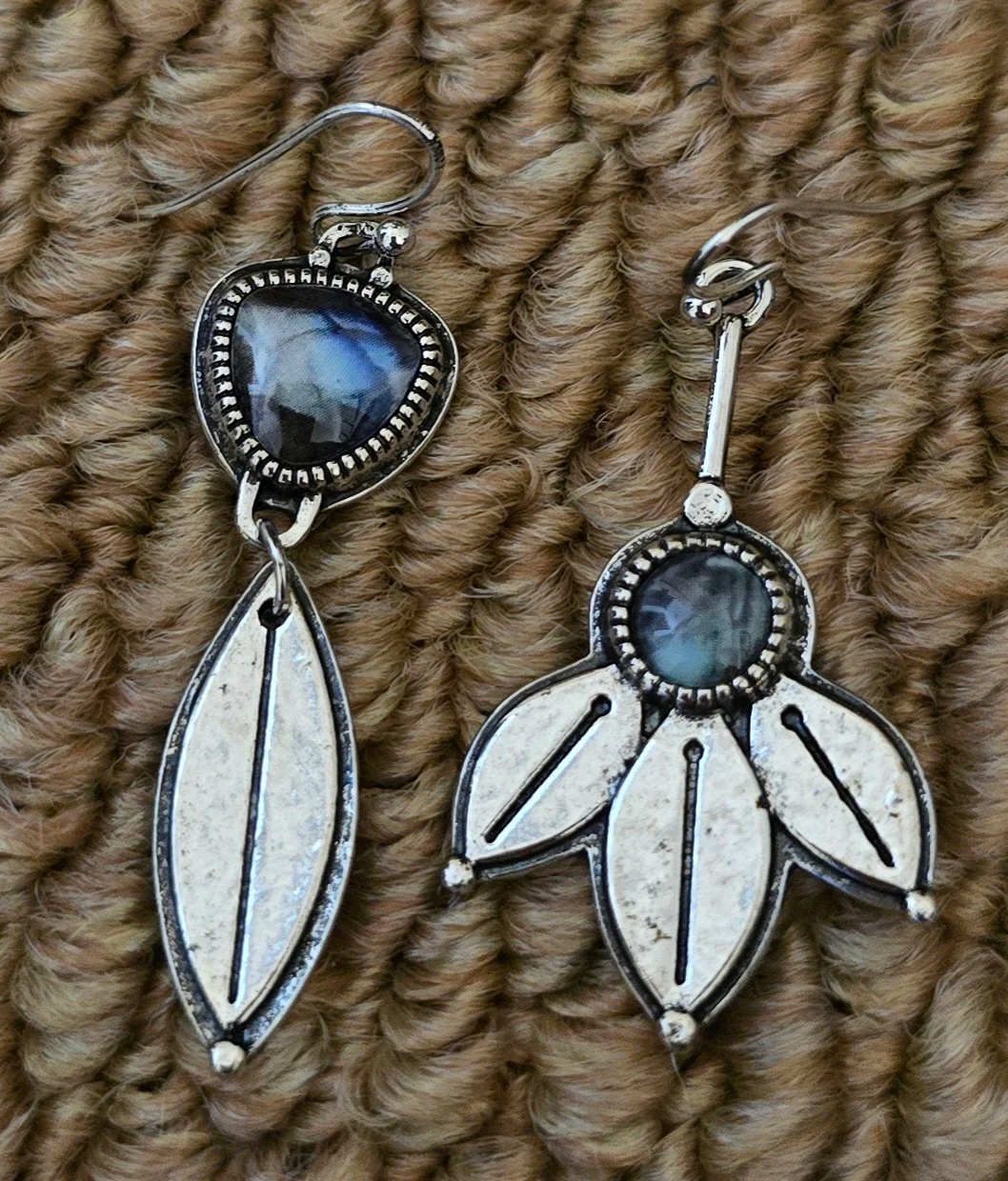 Asymetrical Silver Tone Earrings with Blue Tone Detail.