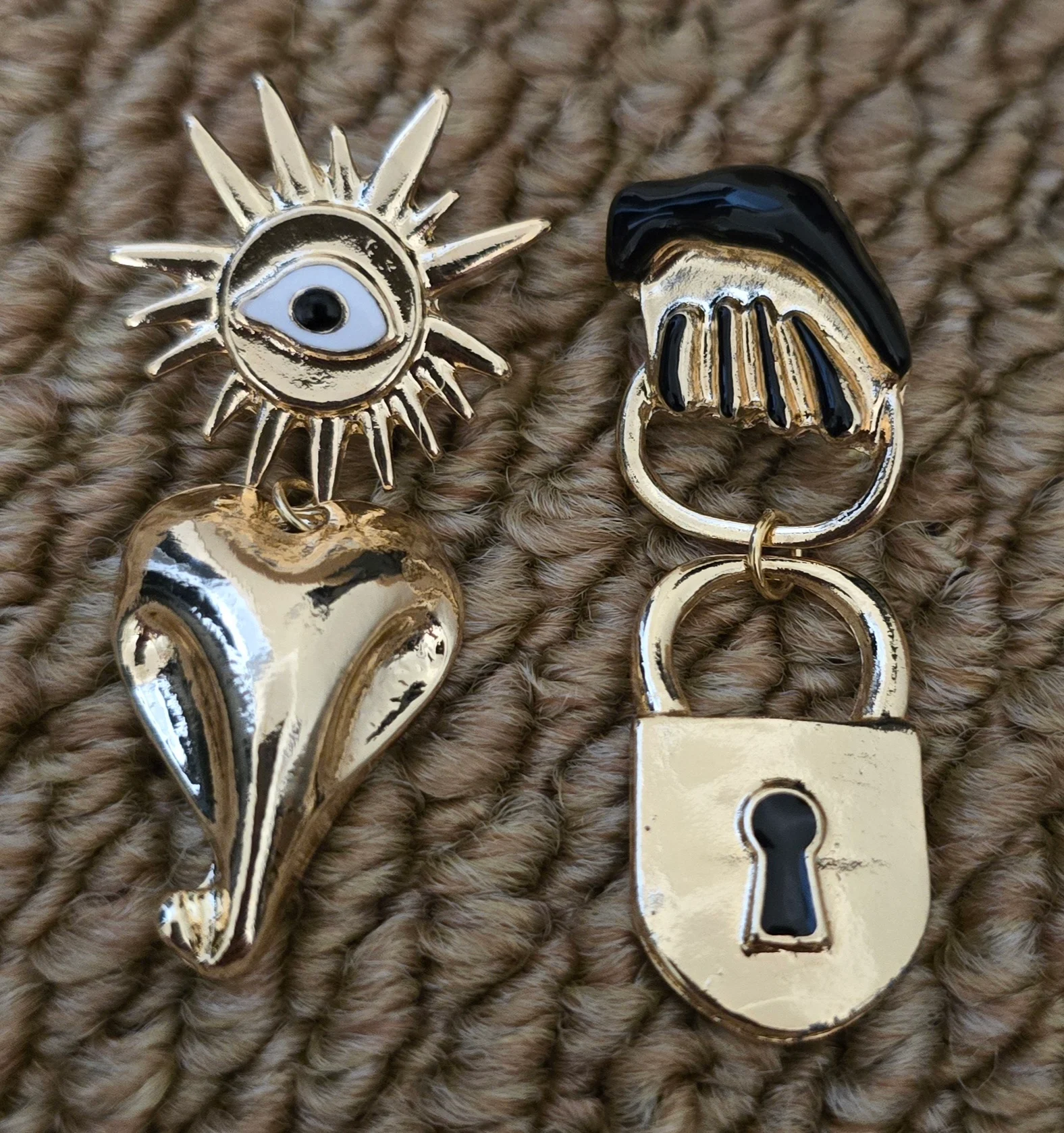 Beautiful Designer Inspired Gold Tone Earrings.