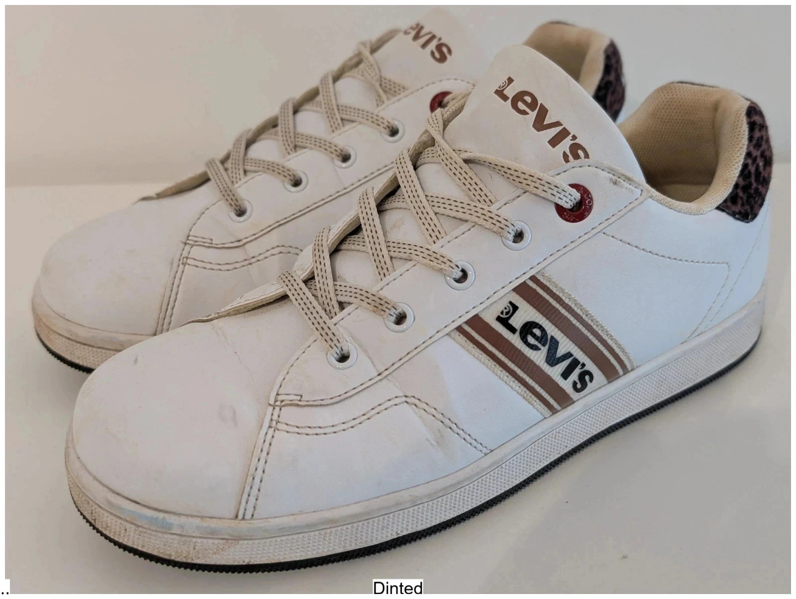 Levi's Basket white trainers with leopard heel design. UK 7.