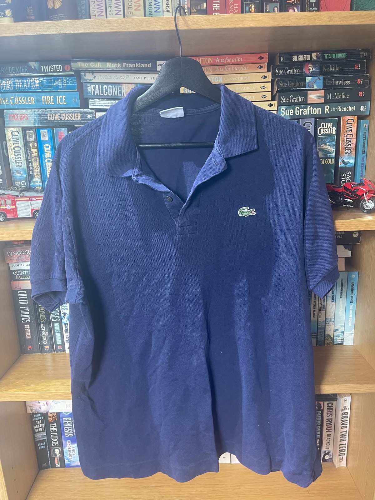 Lacoste blue polo shirt. Size L. Sizes below.
