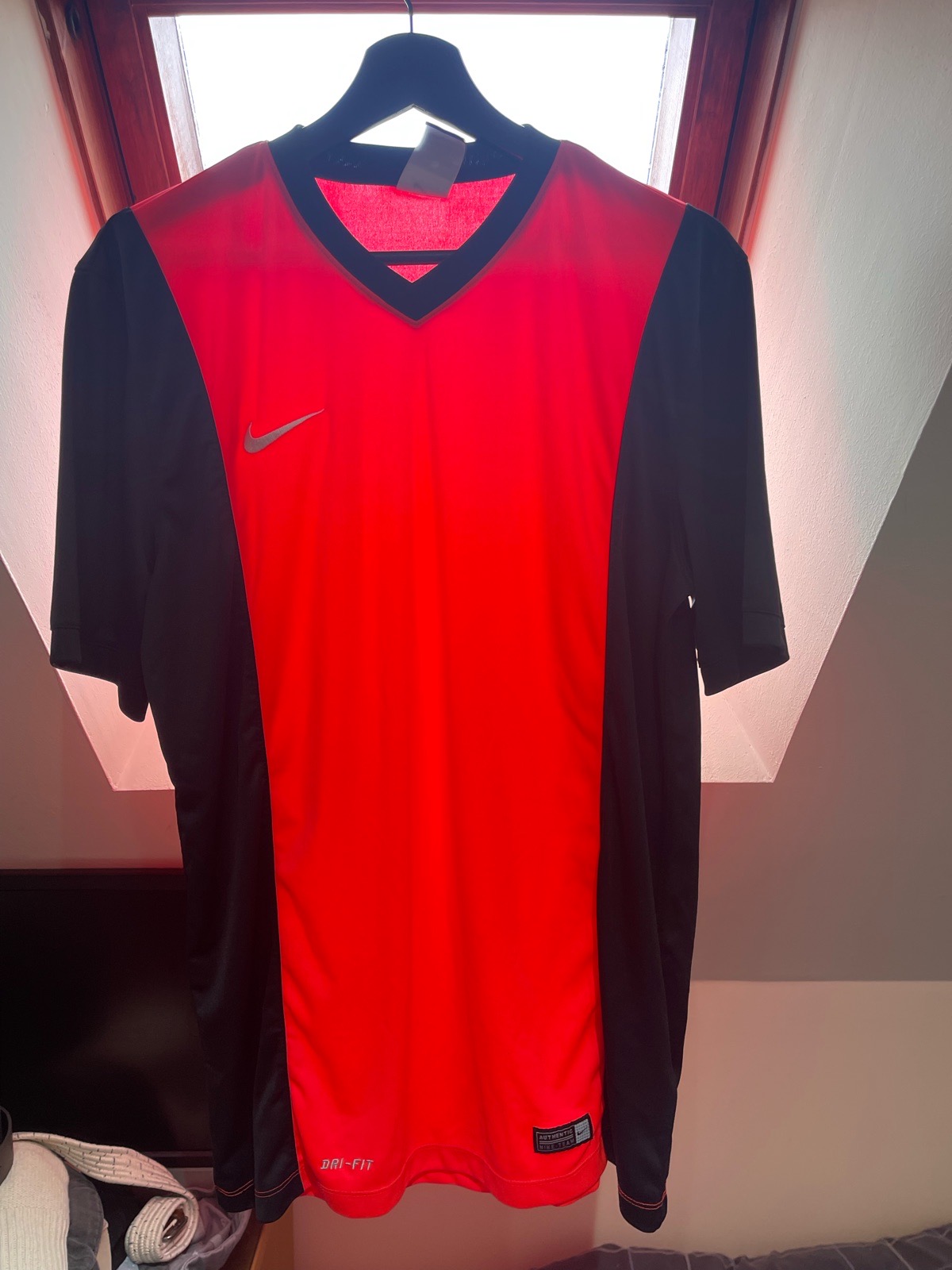 Nike Dri-fit red and black sports top. UK size L.