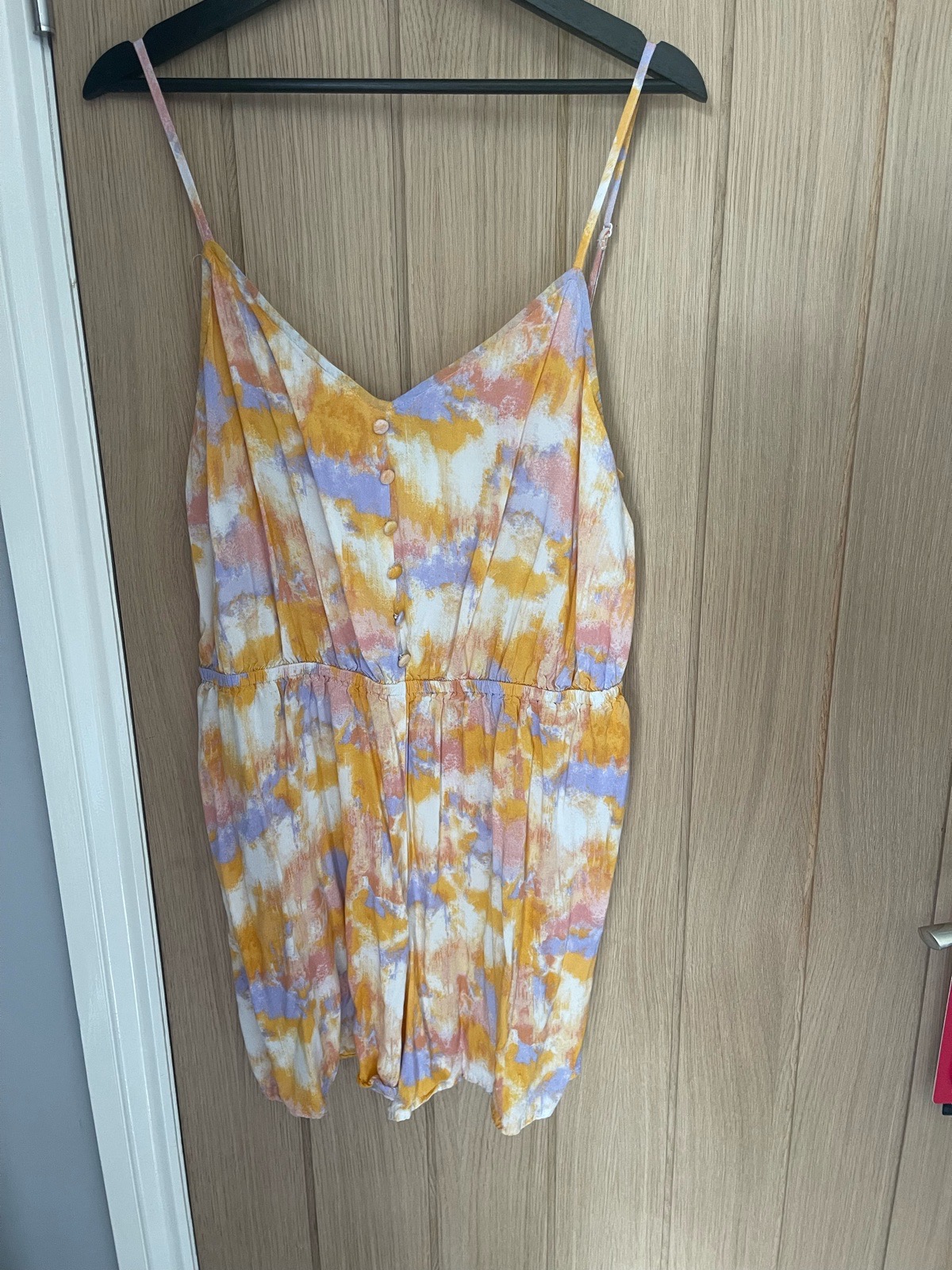 Multi coloured playsuit. UK size 18.