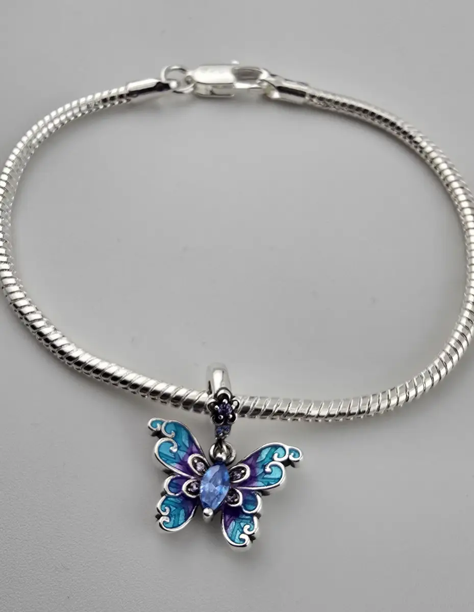 Bracelet with gradient blue butterfly dangle charm.silver