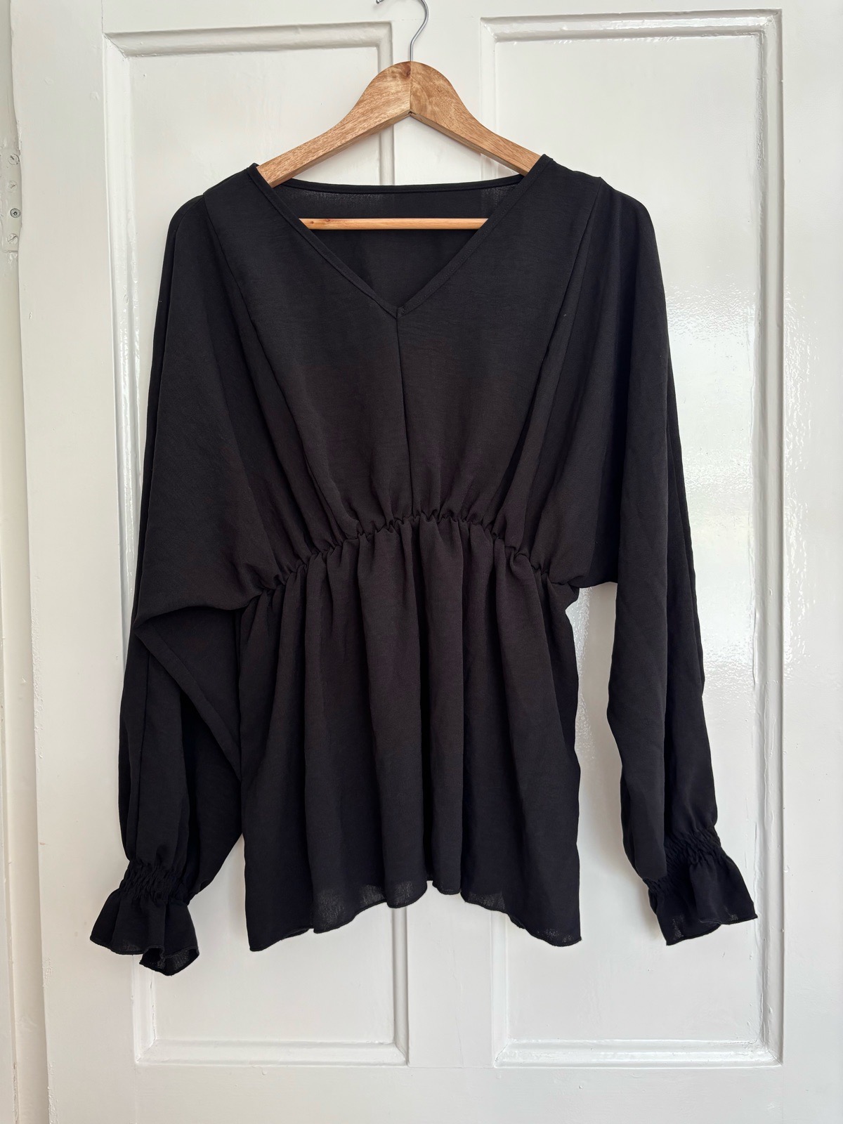 Black Peplum Top | V-Neck | Elastic Waist | UK 10–12 / M | Long Sleeve Frill Cuffs