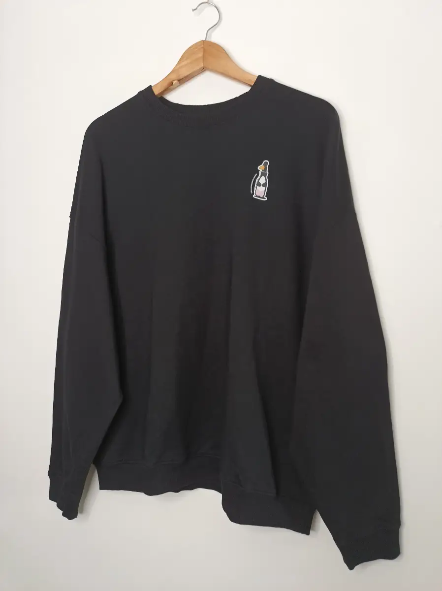 Rapanui Mens Womens Remill Fibre Wallace & Gromit Feathers Pocket Print Oversized Jumper Black M