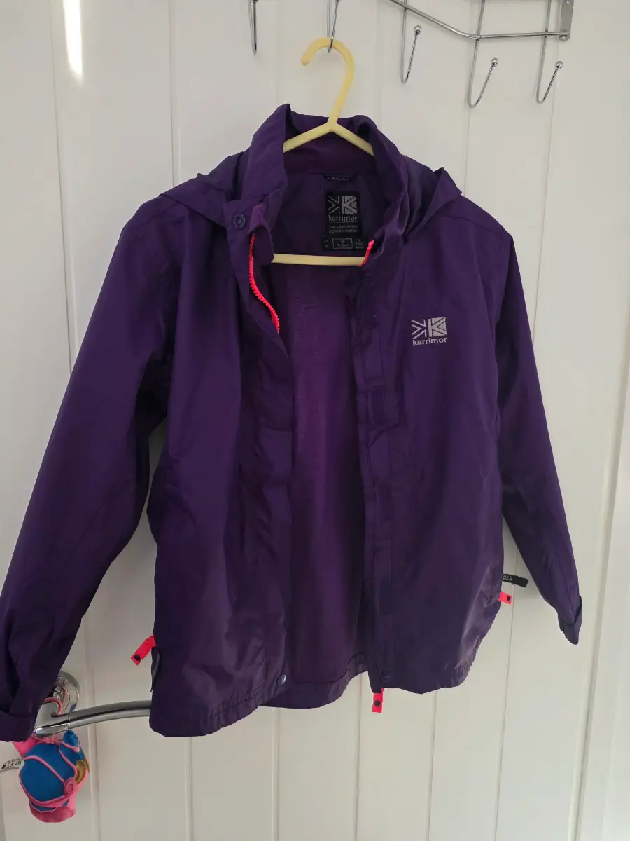 Karrimor lightweight waterproof jacket in purple, suitable for 7–8 years (128 cm).