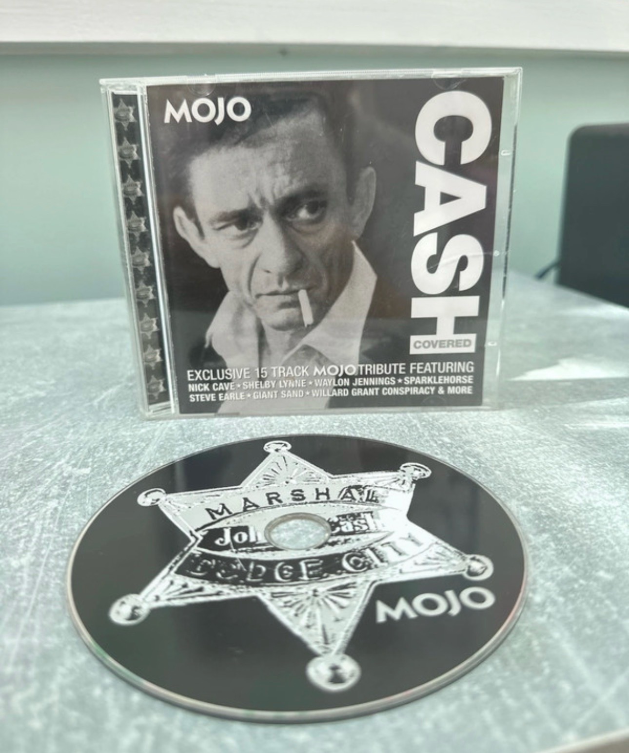Cash Covered CD