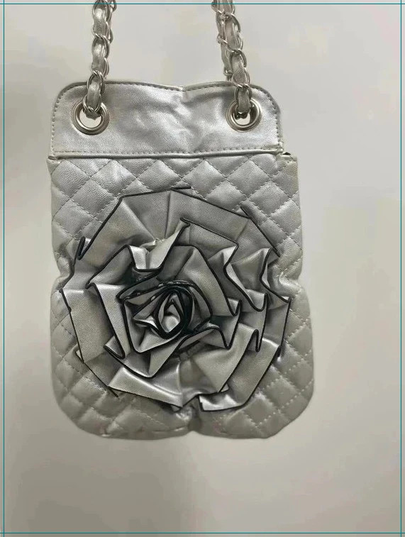 Silver quilted leather flower bag with chain adjustable strap