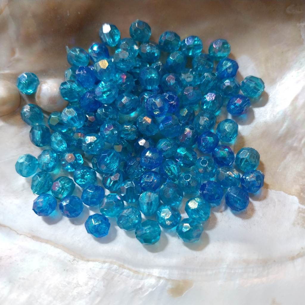 Approx 100 x 6mm blue and blue iridescent beads