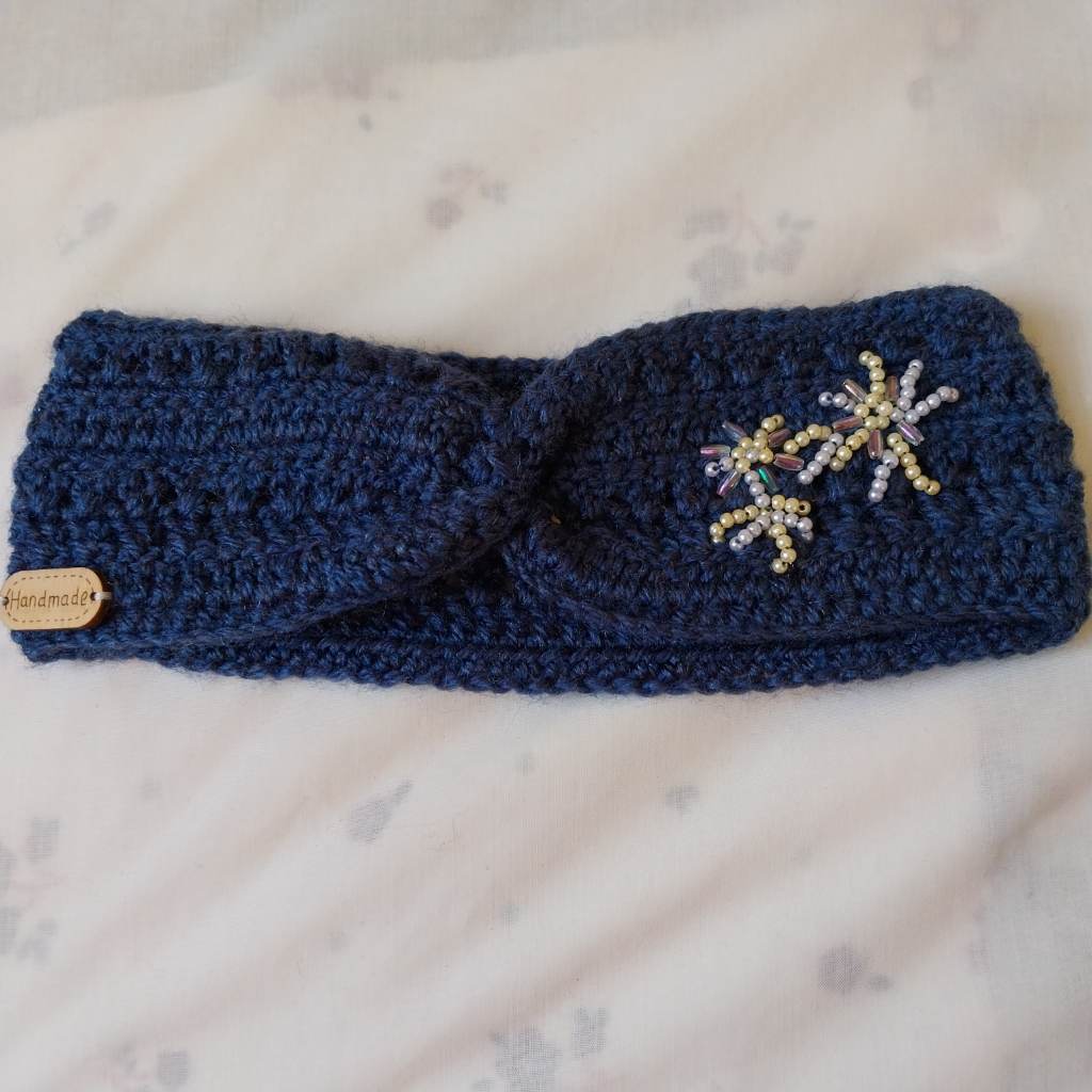 Handmade crochet bandana made with navy blue wool and beaded design