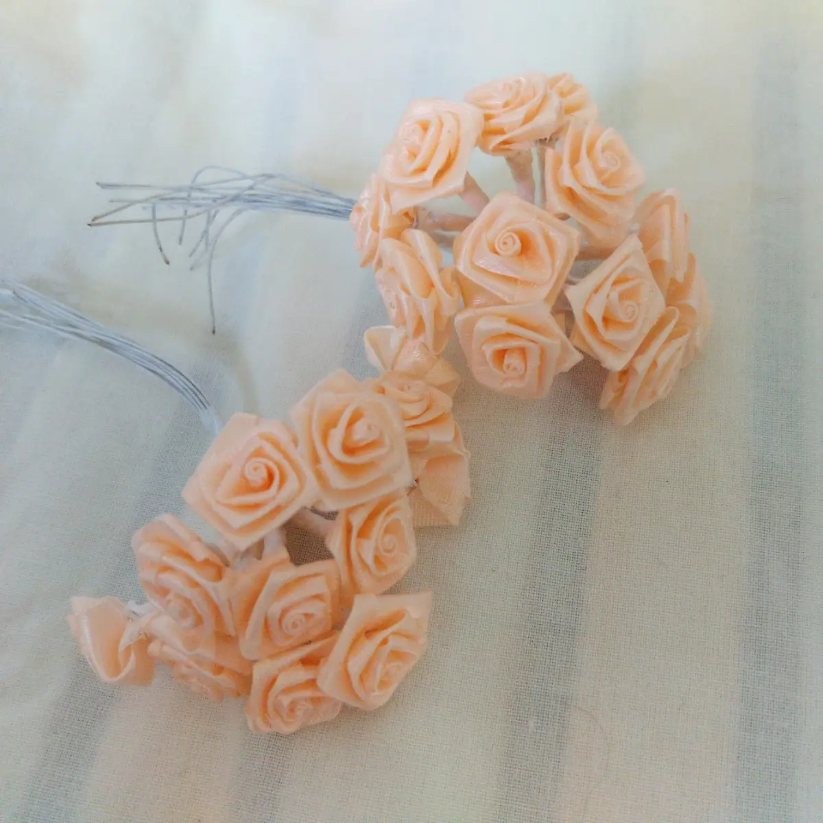 Peach coloured fabric roses x 24