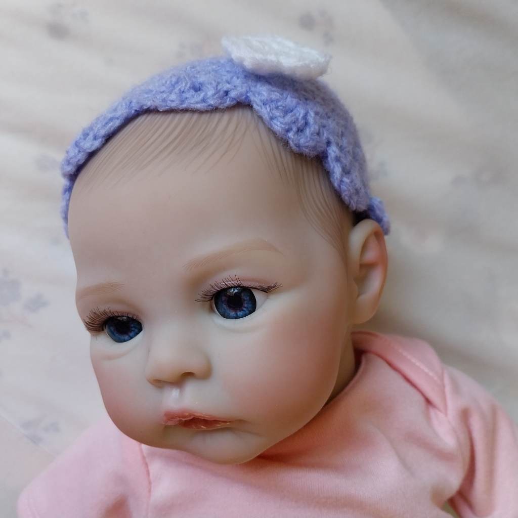 Handmade crochet newborn hat