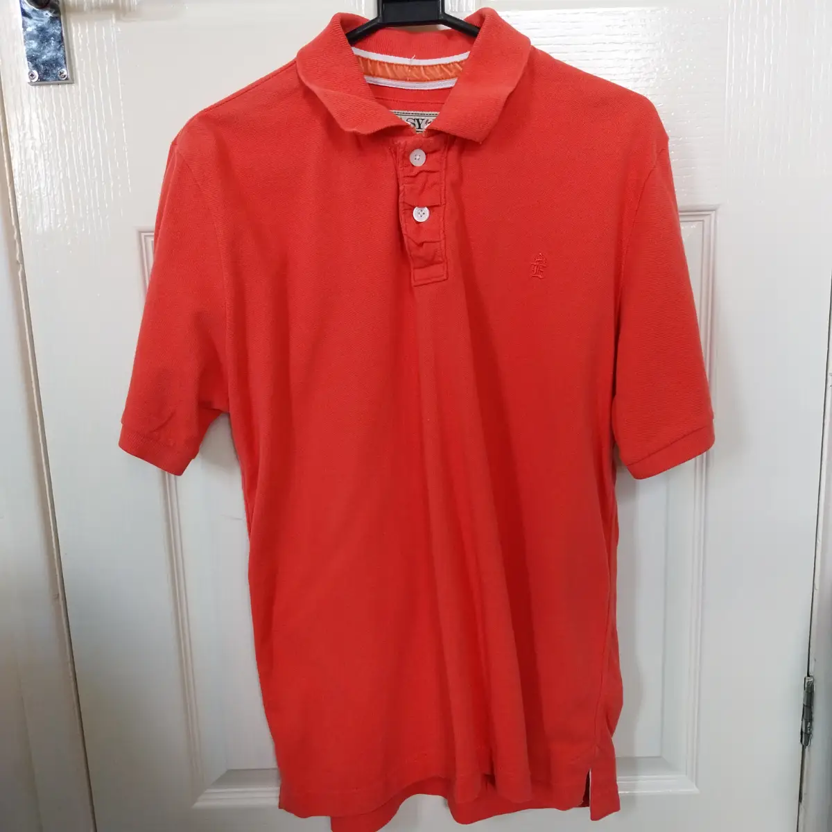 Polo top size large coral coloured