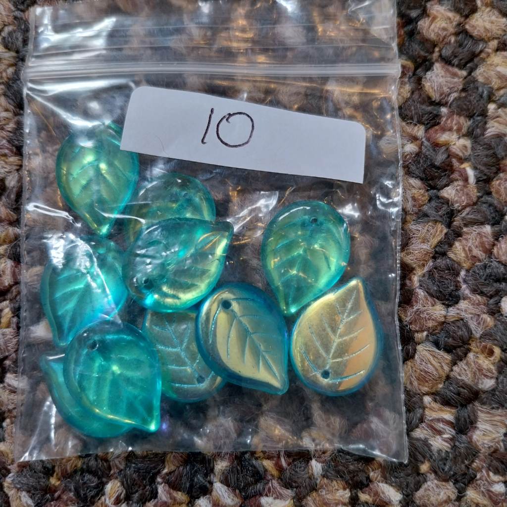10 x glass leaf shaped beads Approx 12mm