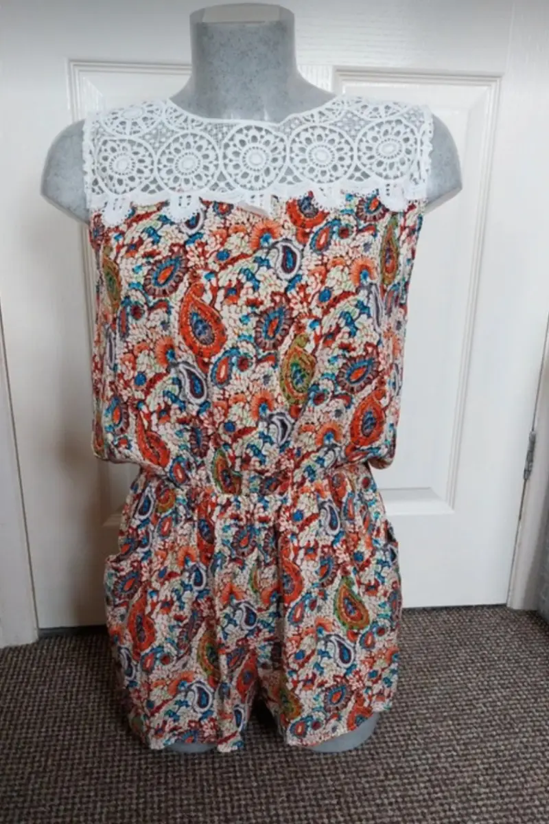 Multicoloured playsuit with lace top