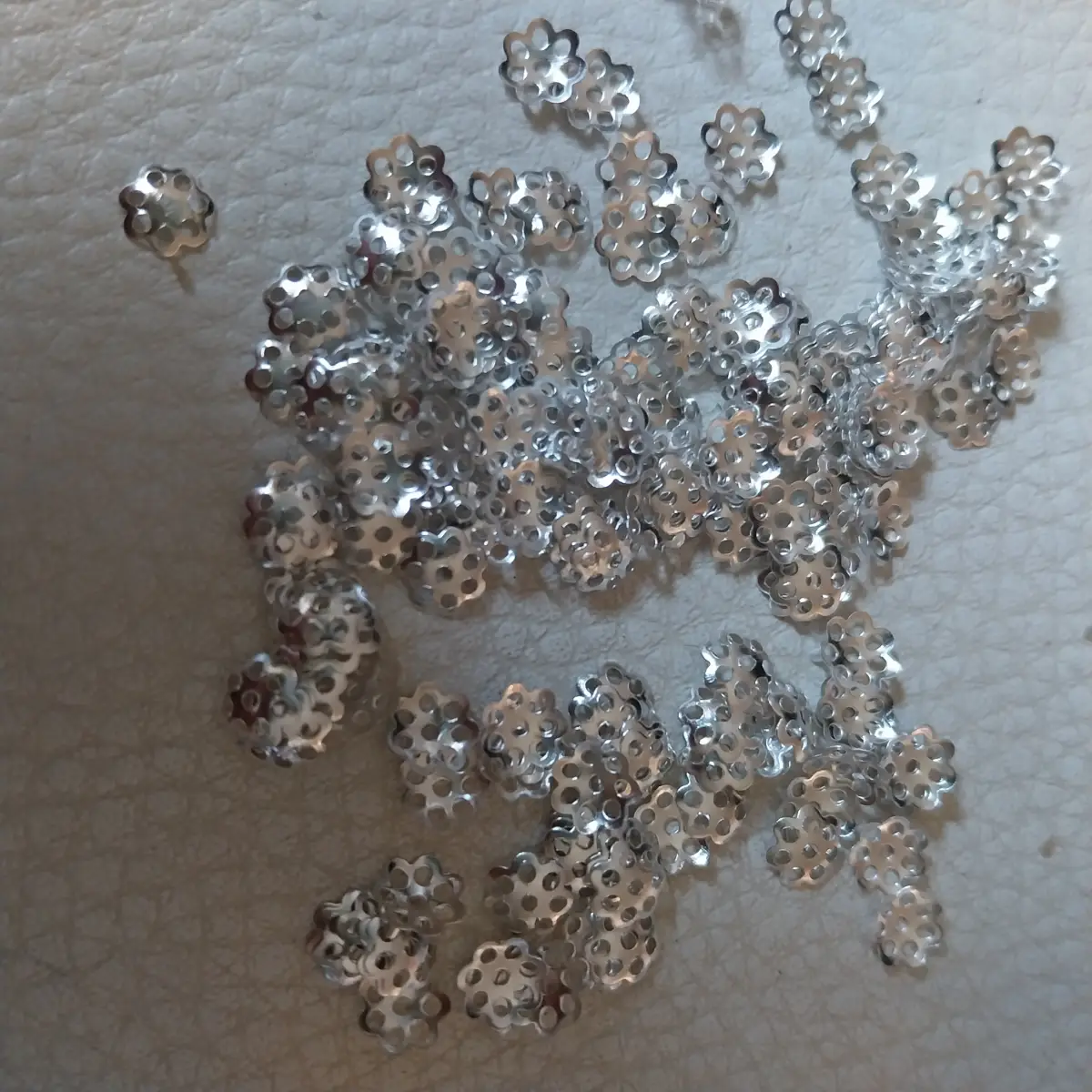 Approx 100 x 6mm bead caps