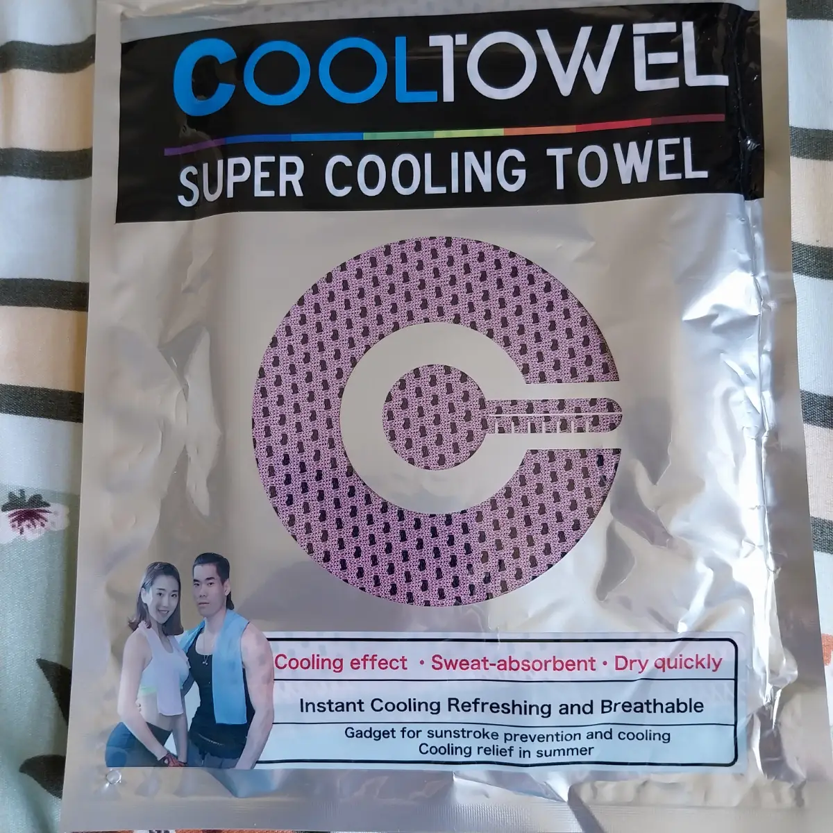 Pink and black super cooling towel