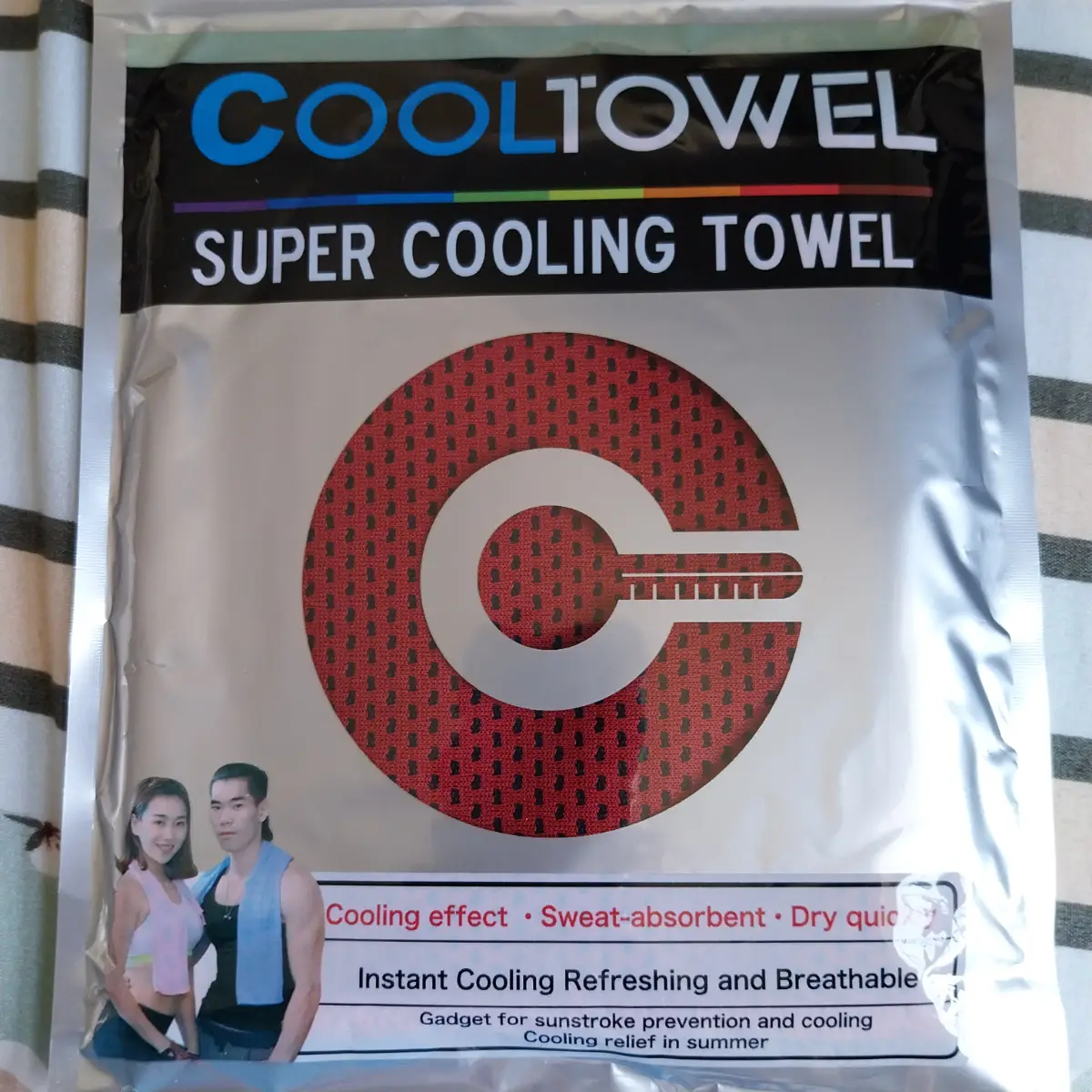 Red and Black coloured cool towel