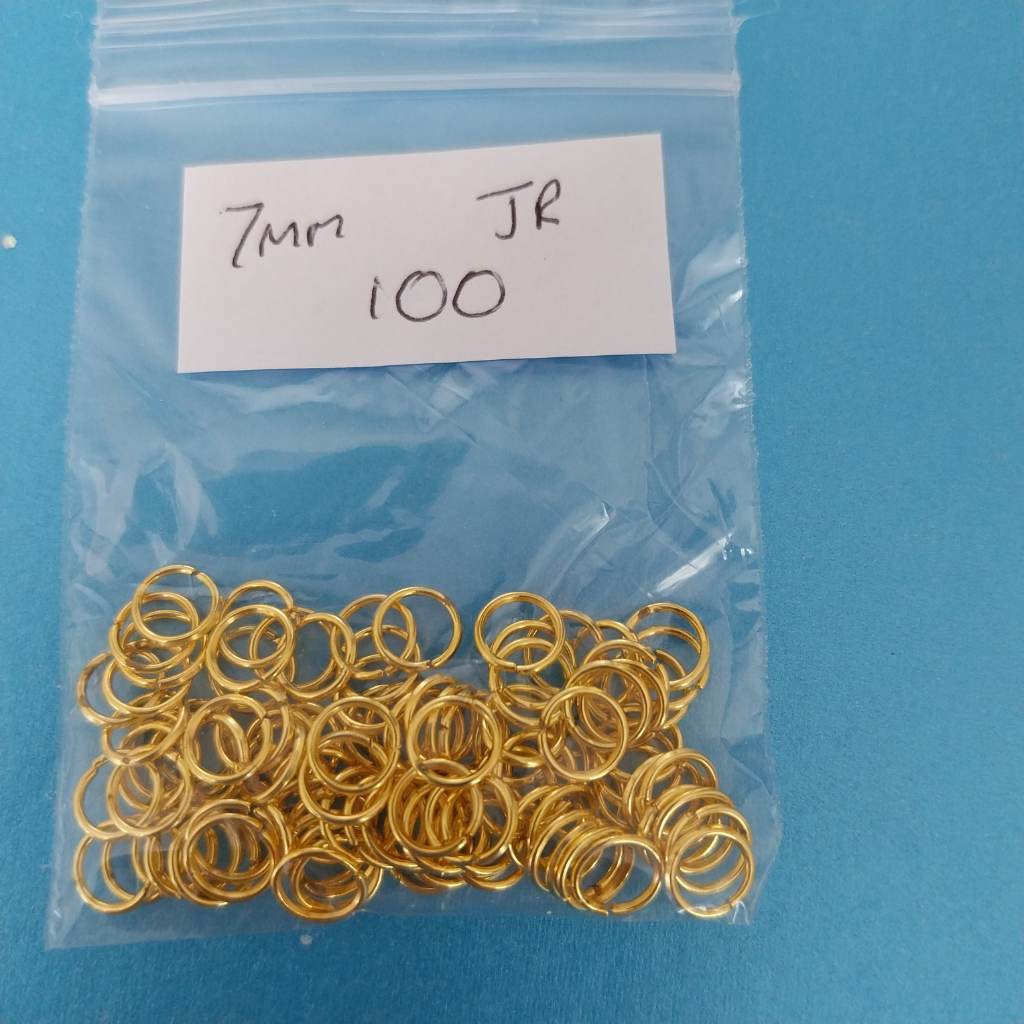 Approx 100 x 7mm jump rings Gold coloured