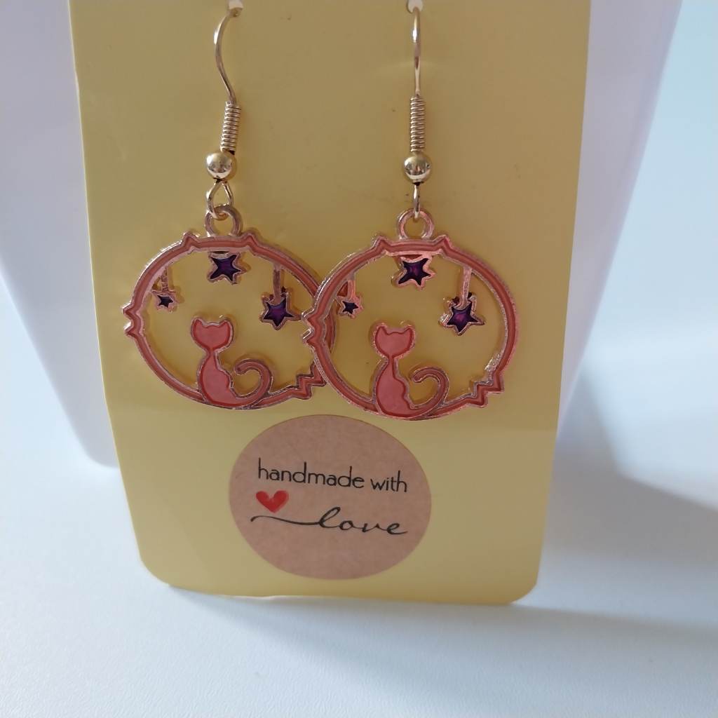 Cat and stars pendent gold coloured earrings