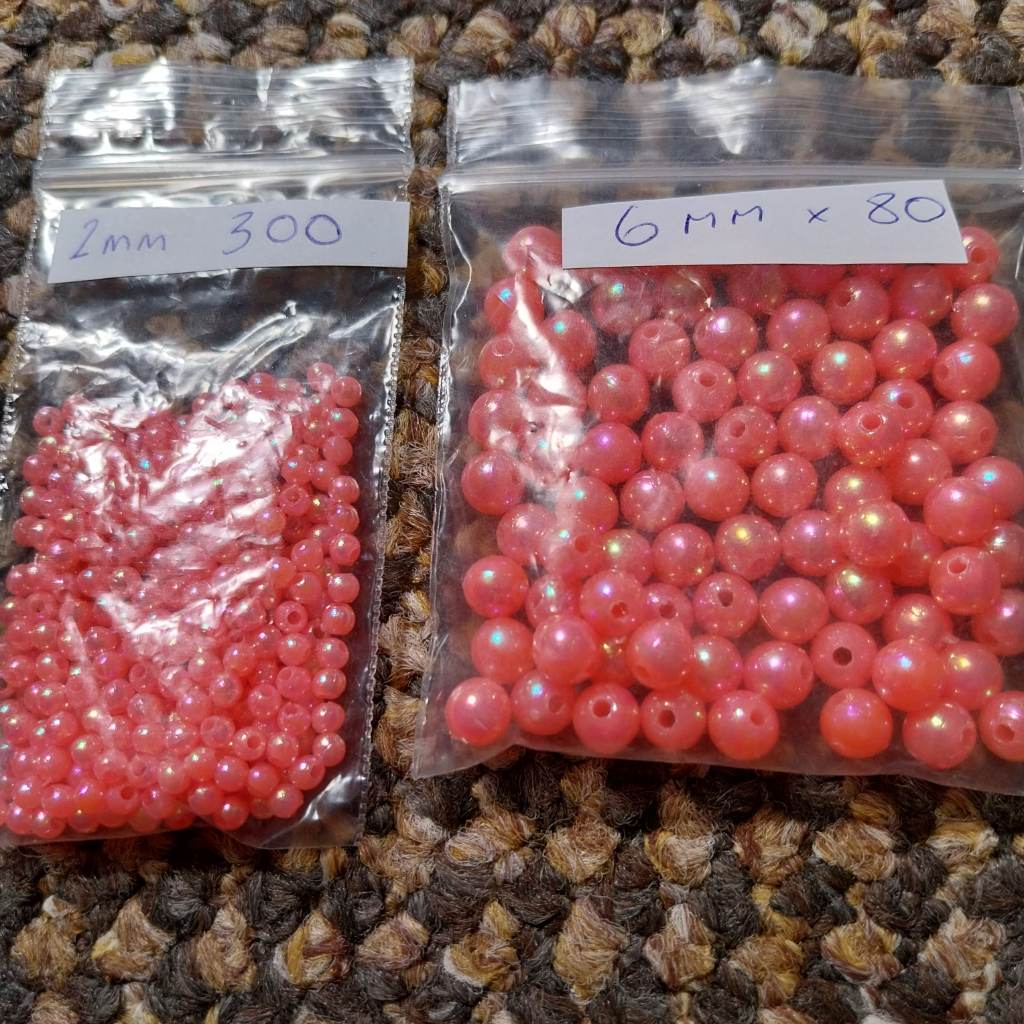 2 x bags of pink beads 1 x 2mm 1 x 6mm