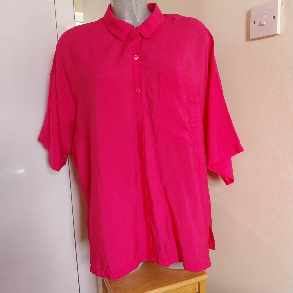 Fuchsia pink button through short sleeved shirt