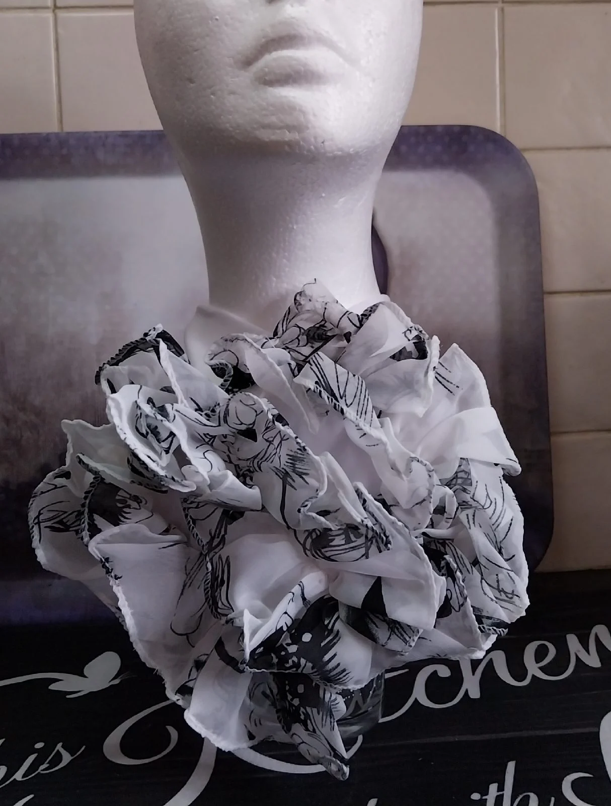 Black and white neck ruffle