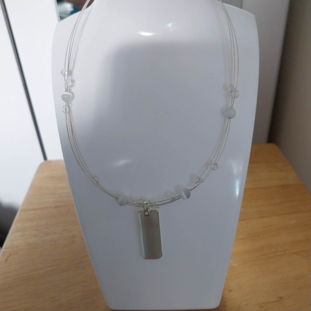 Silver coloured floating necklace