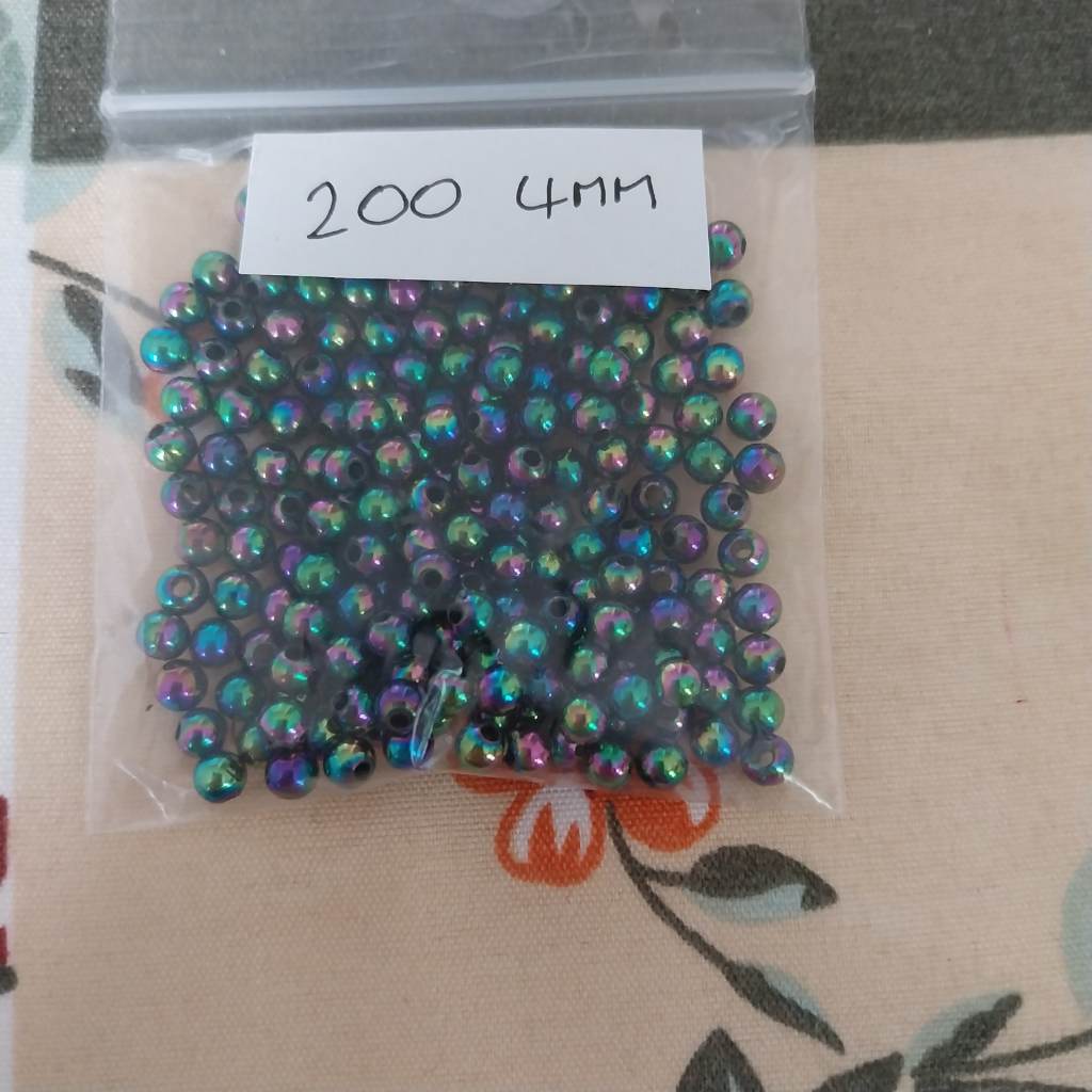 Approx 200 x 4mm iridescent black beads