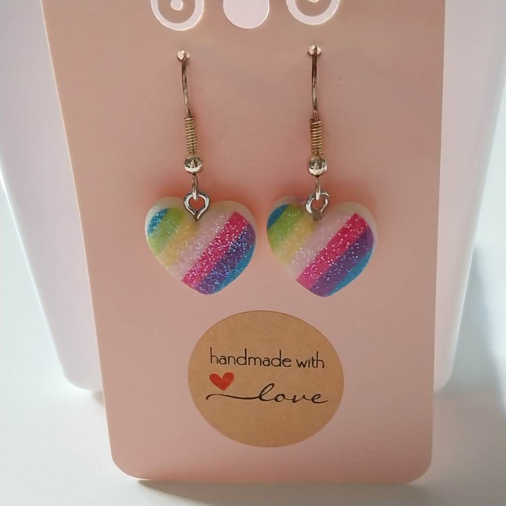 Earrings with rainbow coloured heart beads