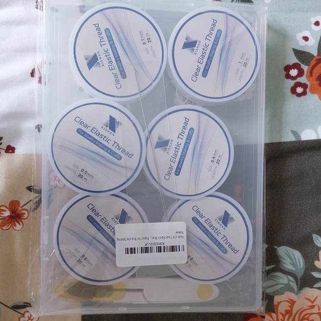 Pack of 6 elastic thread plus needle and cutters