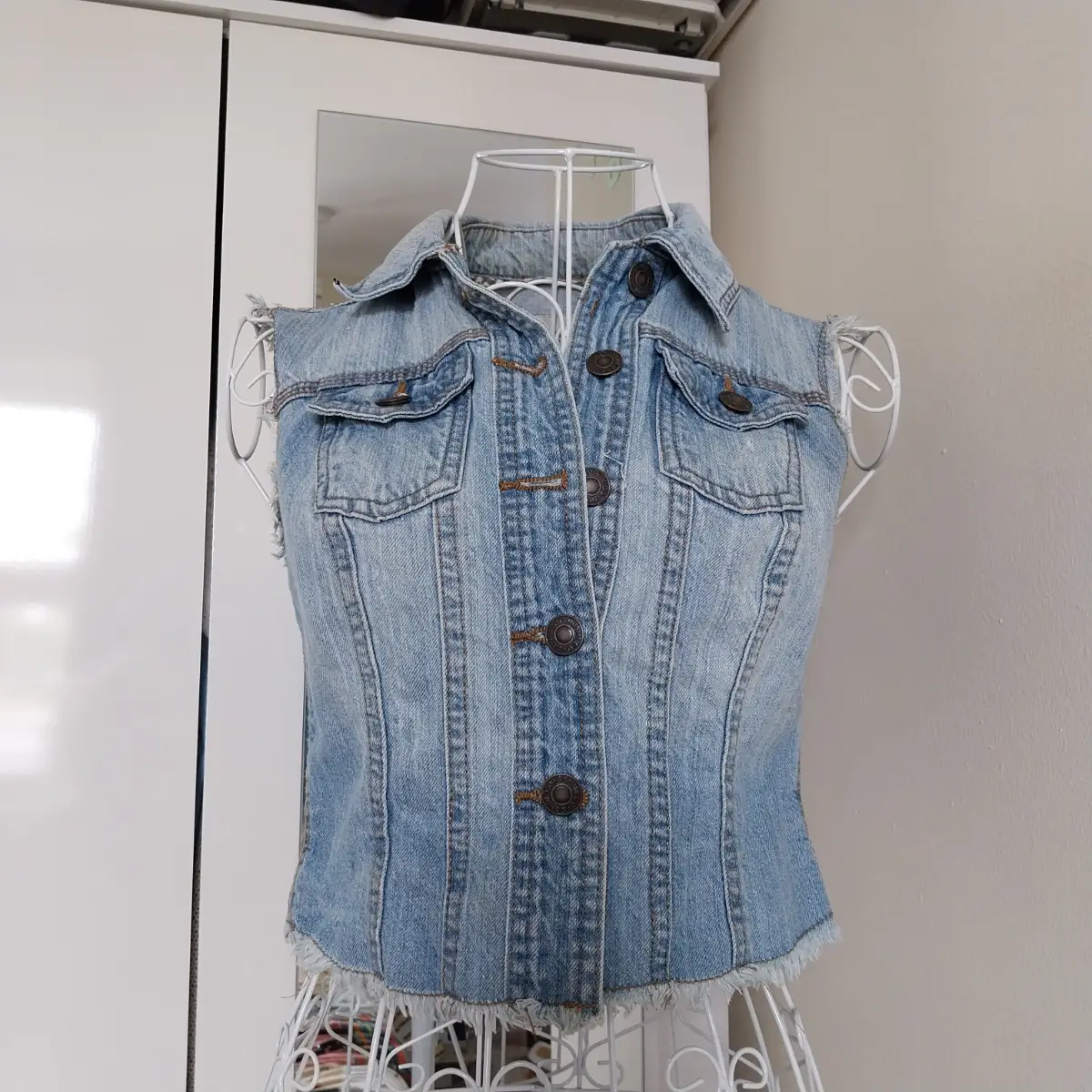 Distressed jeans sleeveless jacket