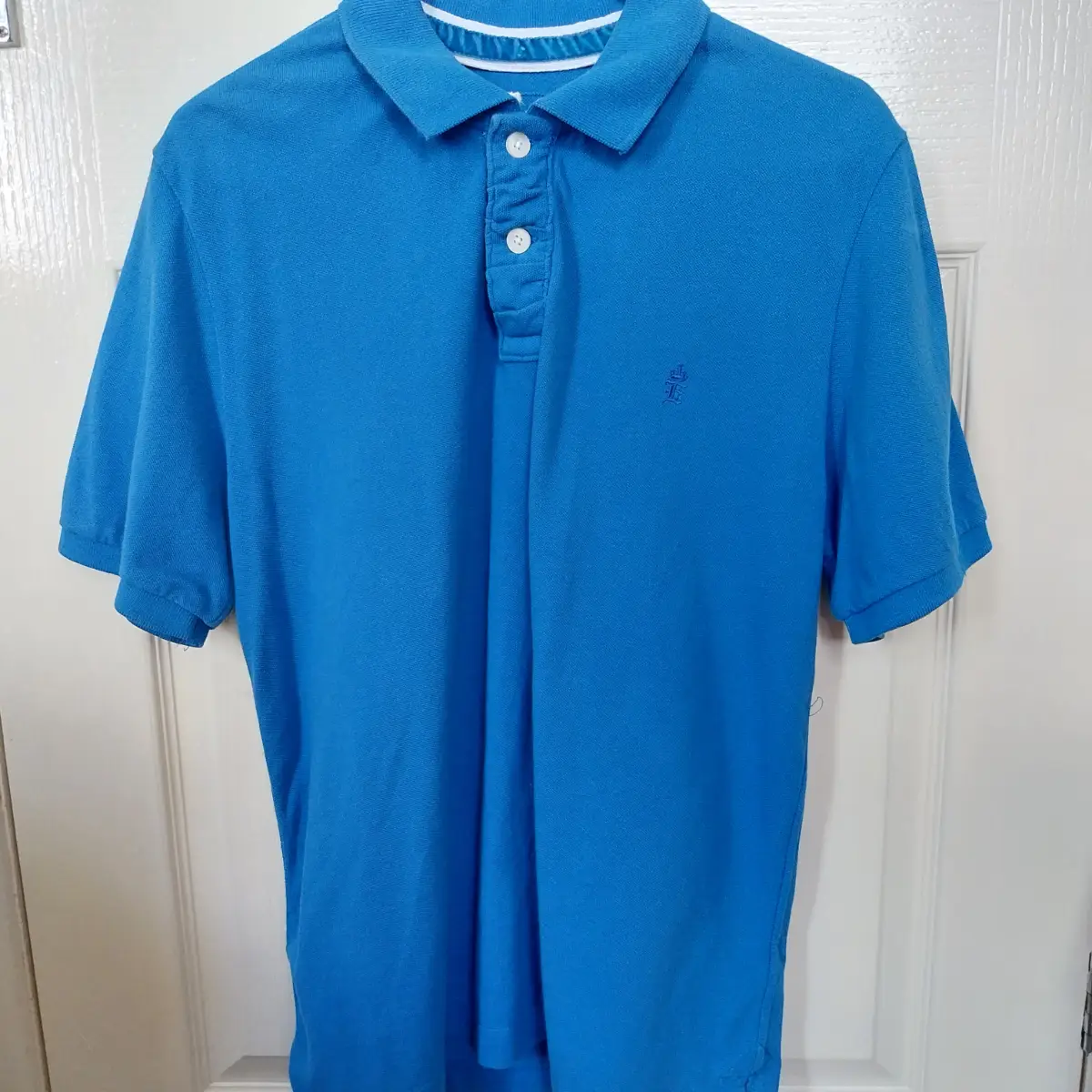 Men's blue polo top size large