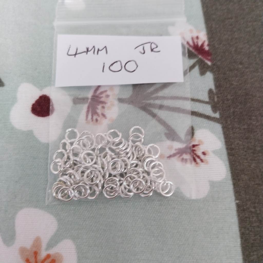 Approx 100 x 4mm silver coloured jump rings findings