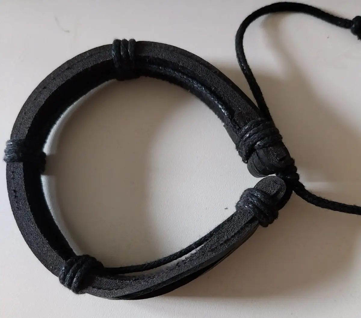 Black coloured leather friendship bracelet