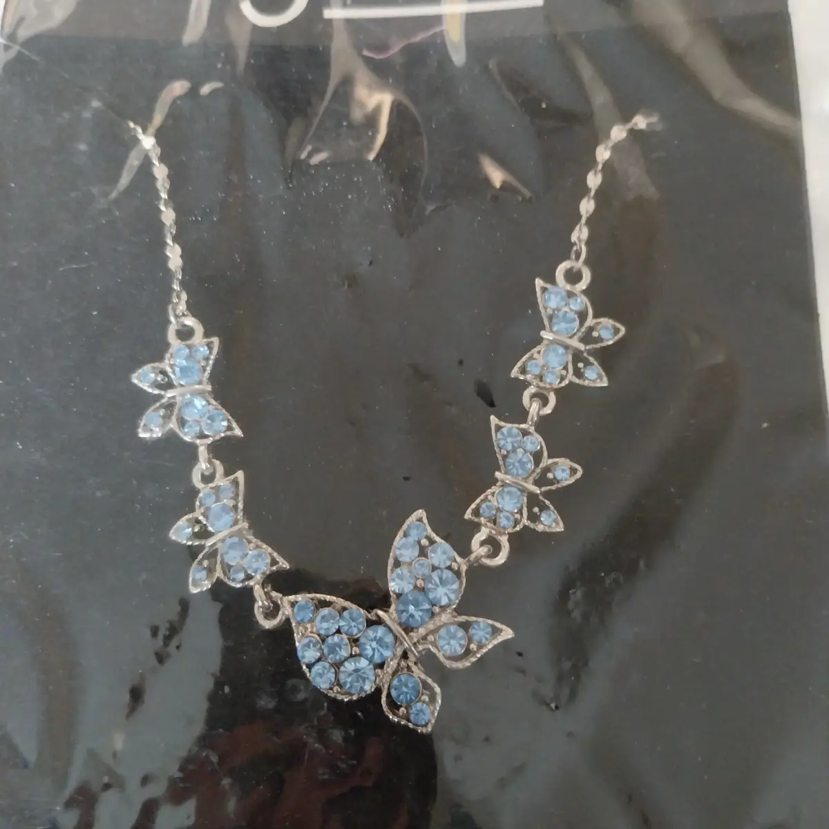 Blue butterfly necklace
